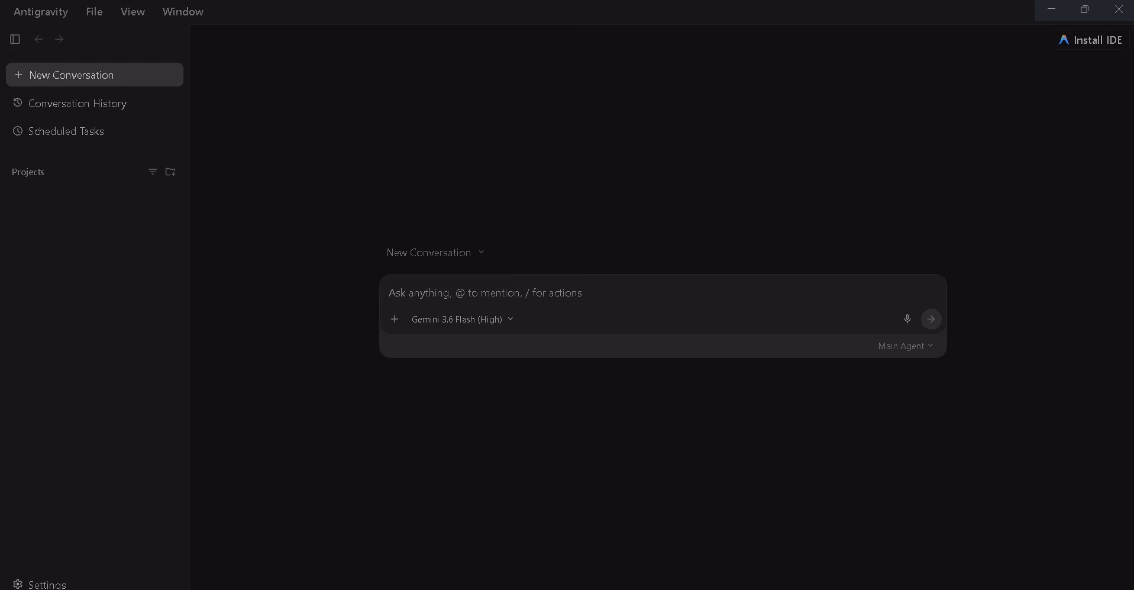Antigravity new-conversation window with the Gemini model selector and agent prompt bar